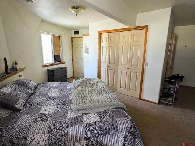 carpeted bedroom with a closet