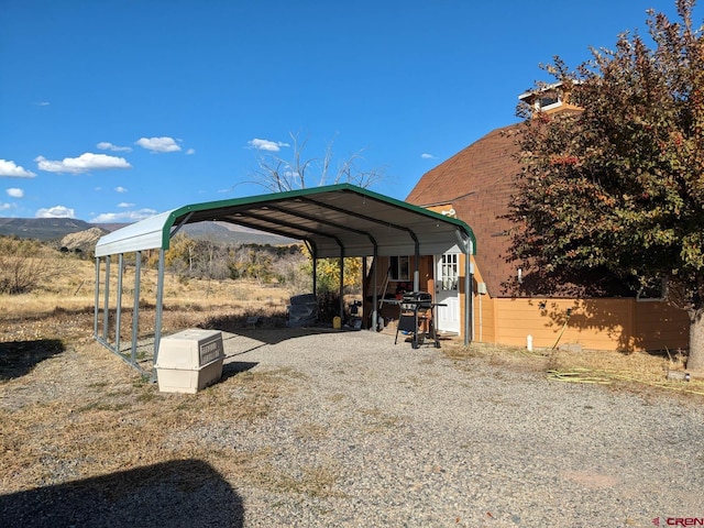 view of car parking with a carport