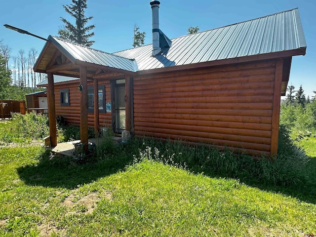 19958 Fs 327th Loop, Mancos, CO 81328 - back of house featuring a yard and metal roof