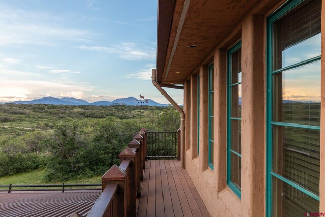 770 S Avalon Dr, Norwood, CO 81423 - wooden terrace featuring a mountain view and a view of trees