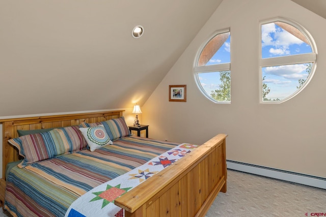 carpeted bedroom with lofted ceiling and baseboard heating