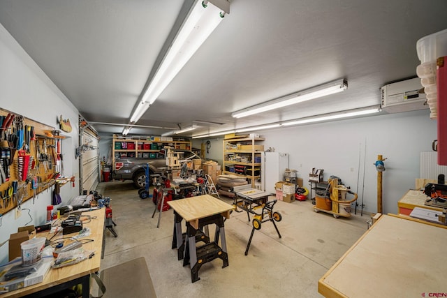 garage featuring a workshop area