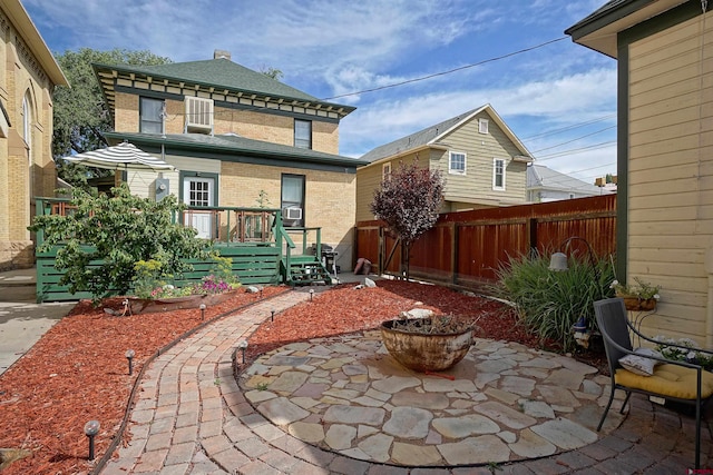 rear view of property with a patio