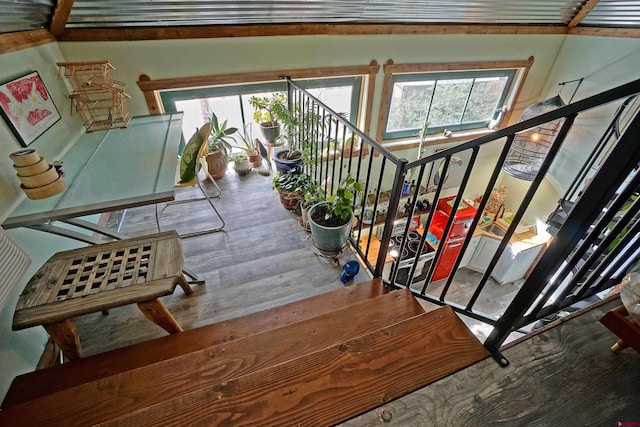 stairway with wood-type flooring