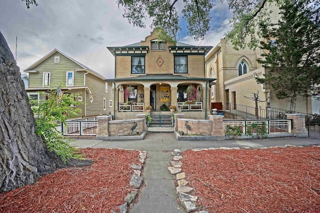 view of front of property featuring covered porch