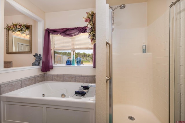 bathroom featuring an enclosed shower