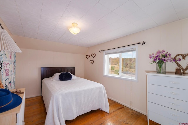 bedroom featuring hardwood / wood-style flooring