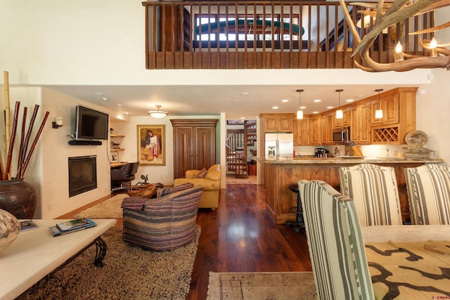 living room featuring dark hardwood / wood-style floors