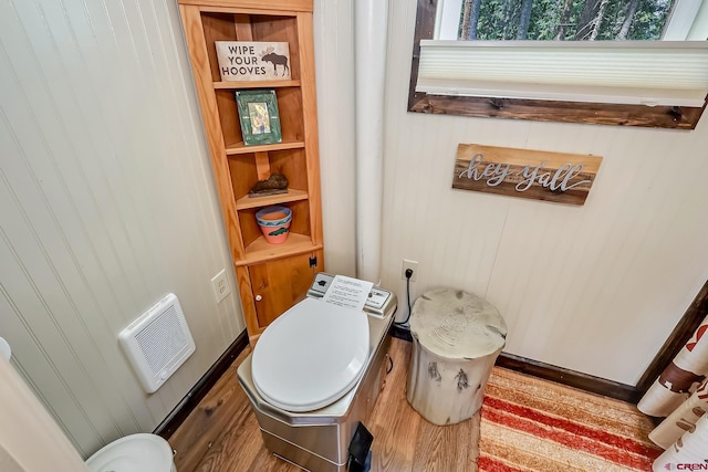 bathroom featuring toilet and hardwood / wood-style floors