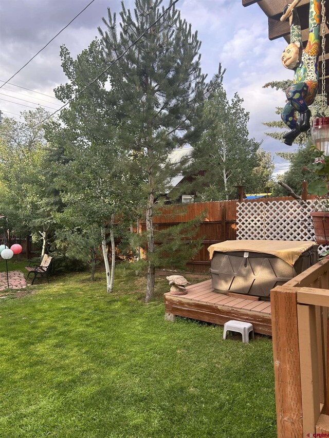 view of yard with a deck