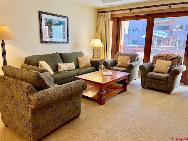 living room featuring light colored carpet