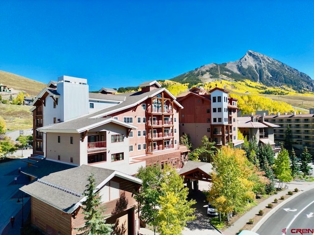 exterior space featuring a mountain view