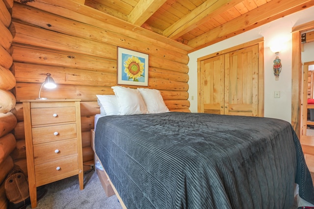 bedroom with wooden ceiling, beam ceiling, log walls, and dark colored carpet