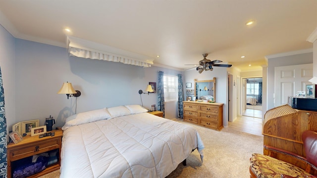 bedroom featuring ceiling fan, ornamental molding, light colored carpet, and recessed lighting