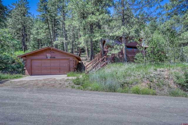 garage featuring driveway