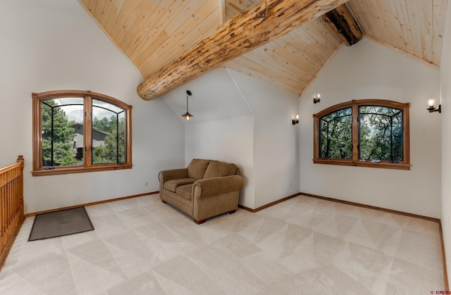 unfurnished room with high vaulted ceiling, plenty of natural light, light colored carpet, and beamed ceiling