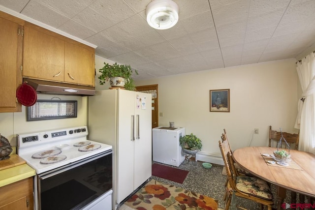 kitchen with a baseboard radiator and white appliances