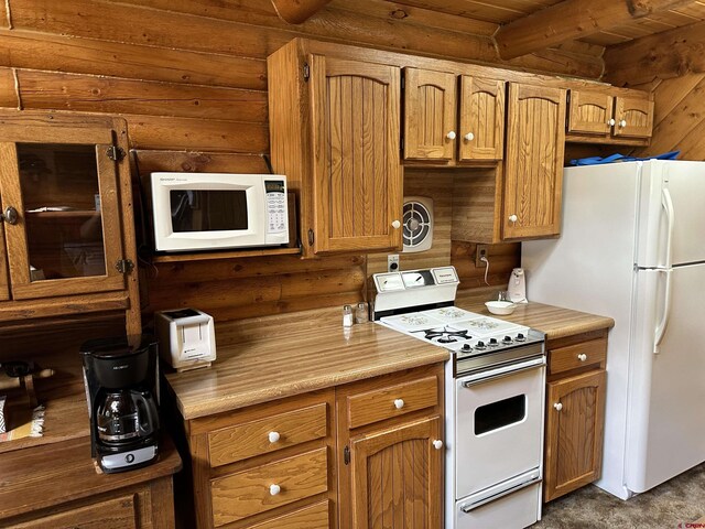 kitchen featuring rustic walls, wooden ceiling, white appliances, and beam ceiling