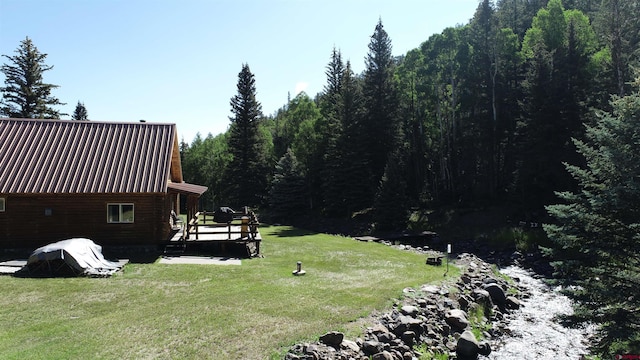 view of yard featuring a deck