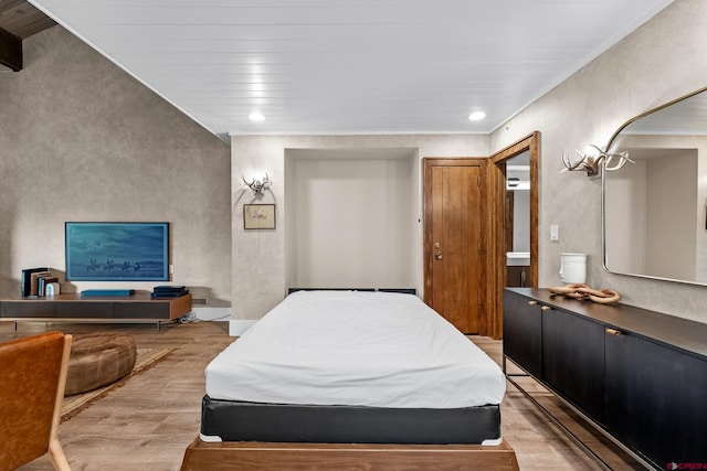 bedroom with light hardwood / wood-style floors