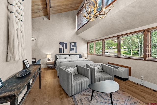 bedroom featuring beamed ceiling, a chandelier, wooden ceiling, an AC wall unit, and hardwood / wood-style flooring