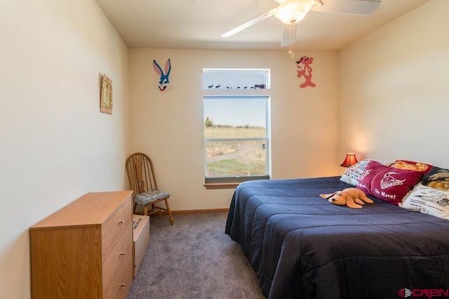 bedroom with ceiling fan and carpet flooring