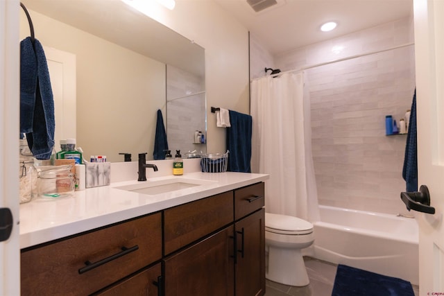 bathroom featuring toilet, shower / bathtub combination with curtain, visible vents, and vanity