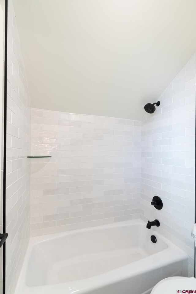 bedroom featuring dark hardwood / wood-style floors and connected bathroom