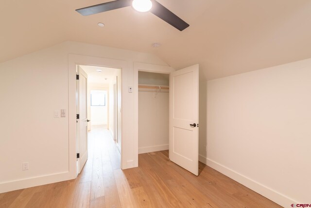 bedroom featuring washer and clothes dryer and light wood-type flooring