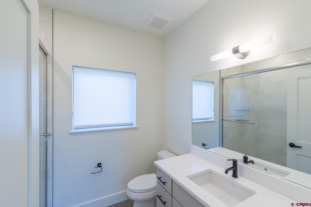 kitchen with decorative backsplash, a healthy amount of sunlight, light hardwood / wood-style floors, and sink