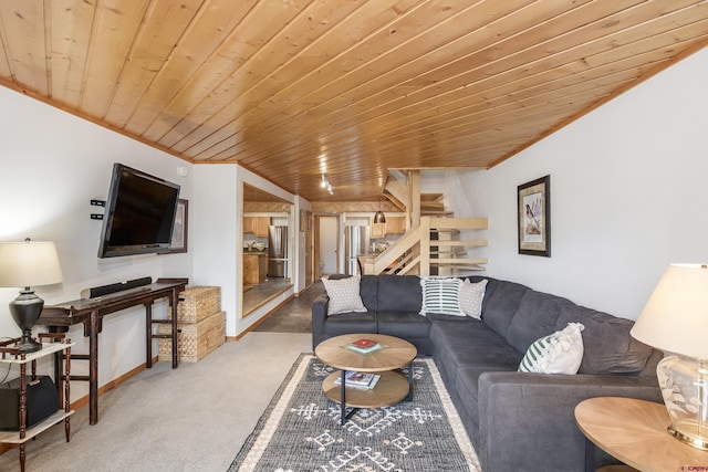 11 Morning Glory Way Unit 6, Crested Butte, CO 81225 - carpeted living area with stairs and wooden ceiling