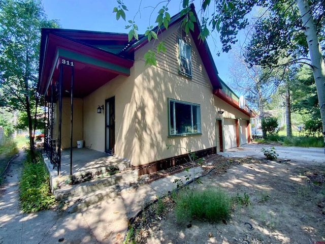 view of home's exterior with a garage