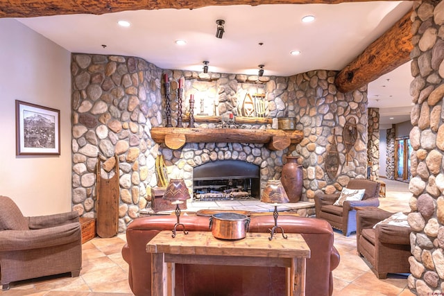 living room featuring light tile patterned floors and a stone fireplace