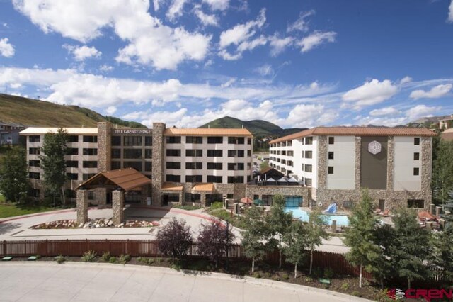 view of property featuring a mountain view