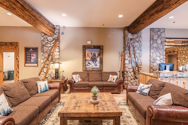 living room featuring beamed ceiling