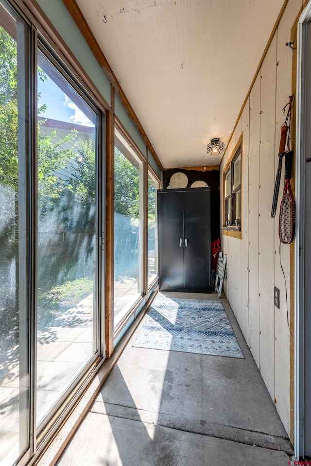 unfurnished sunroom with a healthy amount of sunlight