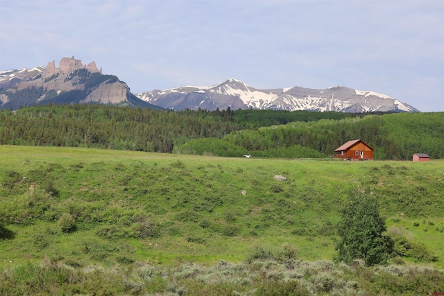 view of mountain feature with a rural view