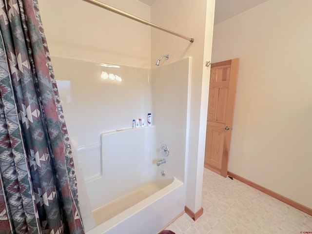 bathroom featuring tile patterned floors and shower / bath combination with curtain