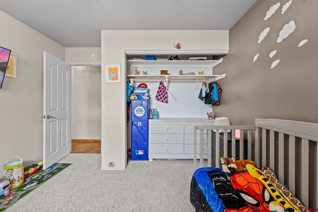 bedroom with a nursery area