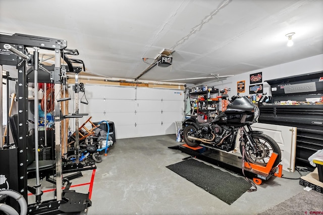 garage featuring a garage door opener