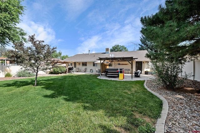 back of property with a lawn, a patio, fence, and a pergola