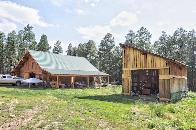 exterior space with a yard