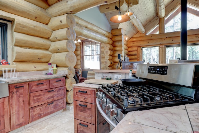 kitchen with log walls, stainless steel gas stove, light tile patterned floors, high vaulted ceiling, and wooden ceiling