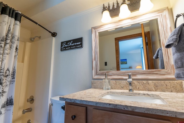 bathroom with shower / tub combo and vanity