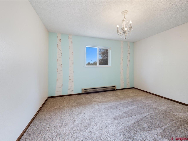 empty room with a textured ceiling, carpet, an inviting chandelier, and baseboard heating