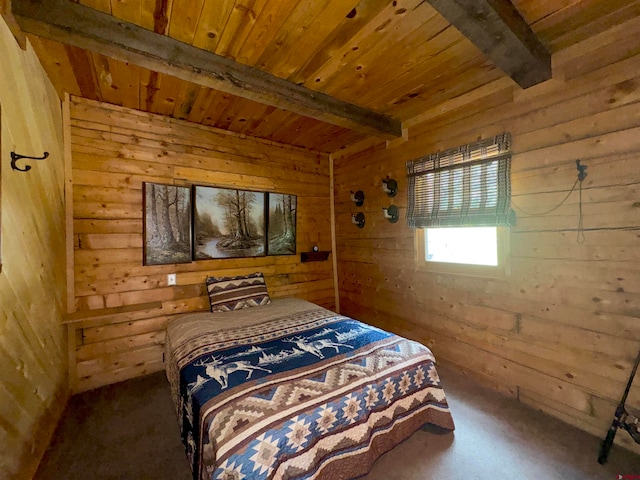 bedroom with wooden ceiling, beamed ceiling, wooden walls, and carpet floors