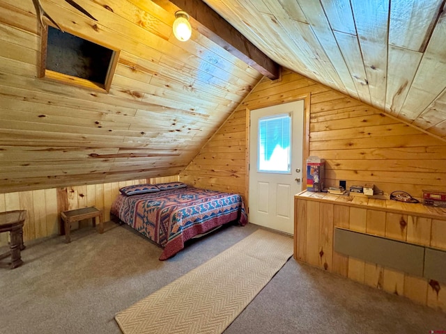 carpeted bedroom featuring wood walls, vaulted ceiling, and wooden ceiling