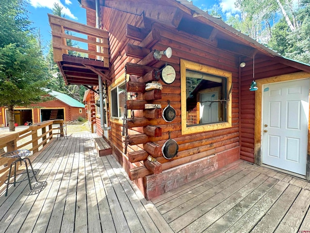 deck featuring an outdoor structure