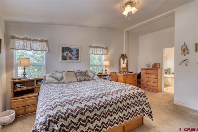 bedroom featuring light carpet, baseboards, multiple windows, and ornamental molding