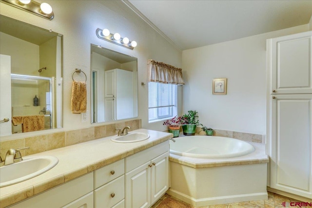 full bath featuring a bath, a shower stall, double vanity, and a sink